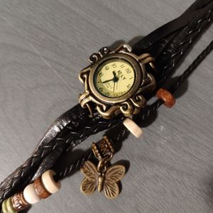 Leather banded watch accessory. Needs battery